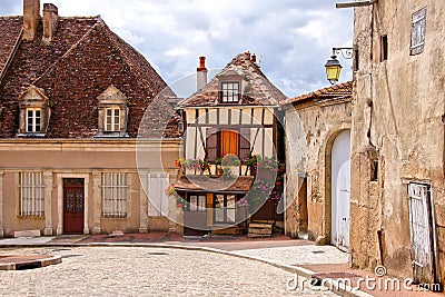 Timbered house on a quaint street in Burgundy, France Stock Photo