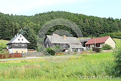 Timbered houses under Castle Houska Stock Photo