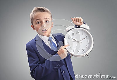 Time on clock shocked and surprised late young executive businessman boy Stock Photo