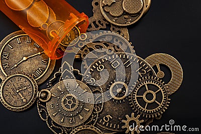 Time cures everything or time heals every pain concept with a bottle of prescription painkiller bottle and small metallic clock Stock Photo