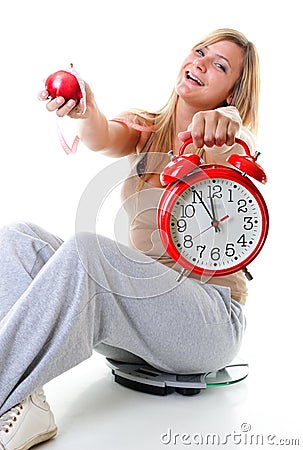 Time for diet slimming. Large girl with scale. Stock Photo