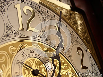 Time on a grandfather clock Stock Photo