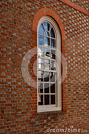 Classic White Window in Brick Facade Stock Photo