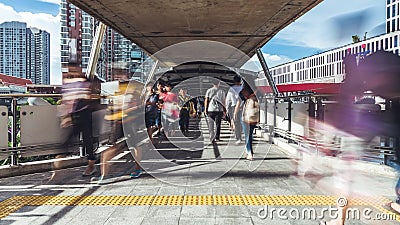 Time-lapse of crowded Asian people walk on public pedestrian walkway. Commuter lifestyle, Asia city life, transportation concept. Fast motion time-lapse of stock video footage Time-lapse of crowded Asian people walk on public pedestrian walkway. Commuter lifestyle, Asia city life, transportation concept. Fast motion time-lapse of stock video footage
