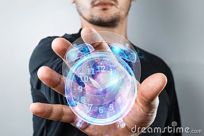 Time management concept, A man shows a hologram of a clock close-up. Hourly poes, passage of time, dead line. Copy space Stock Photo