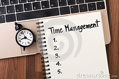 Time management with list on notebook Stock Photo