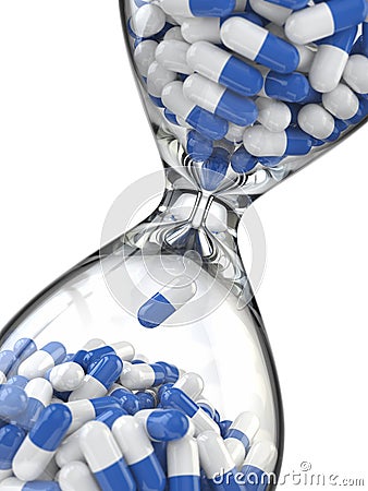 Time of medicine. Pills in hourglass Stock Photo