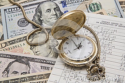 Time money cash financial management pocket watch checkbook Stock Photo