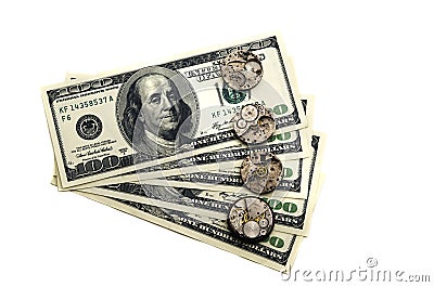 Time is money. The old clock mechanisms are located on dollars Stock Photo