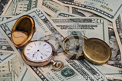 Time money watch and compass Stock Photo