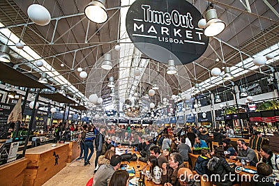 Time Out Market Lisboa. Crowd of people eating. Editorial Stock Photo