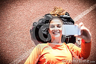 Time for self picture. Young sport woman. Stock Photo