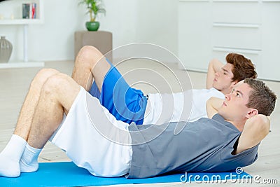 Time to do sit-ups Stock Photo