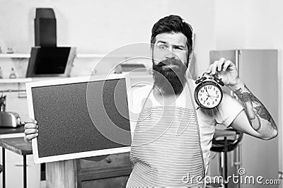 Time to eat. Dinner time. Hipster cook. Interval fasting diet. Restaurant information. Time management is key ingredient Stock Photo