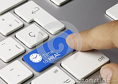 Time to HEAL - Inscription on Blue Keyboard Key Stock Photo