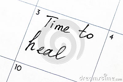 `time to heal` text write on calendar Stock Photo