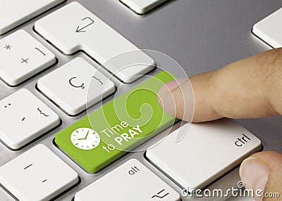 Time to Pray- Inscription on Green Keyboard Key Stock Photo