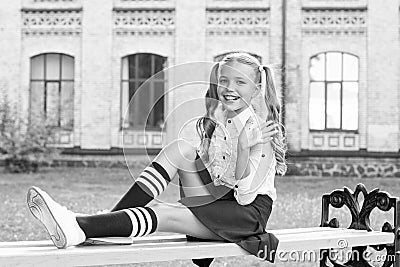 Time to relax and have fun. Relaxing in school yard. Perfect schoolgirl relaxing between classes. Life balance. Student Stock Photo