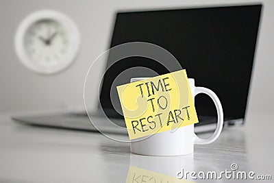 Time to Restart is shown using the text and photo of clock Stock Photo