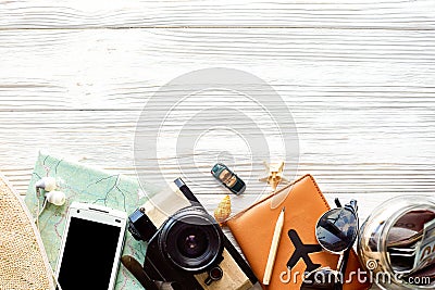 time to travel concept, wanderlust vacation background flat lay, space for text. camera sunglasses passport money map phone hat c Stock Photo