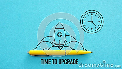 Time to upgrade is shown using the text and the picture of the clock and the rocket launch Stock Photo