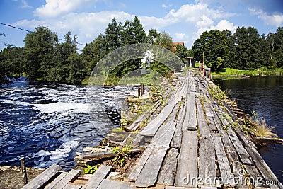 Time worm and damaged by water wooden bridge Stock Photo