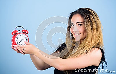 Time zone. punctuality and discipline. girl hold alarm clock. regime early awakening. bell is ringing. good morning Stock Photo