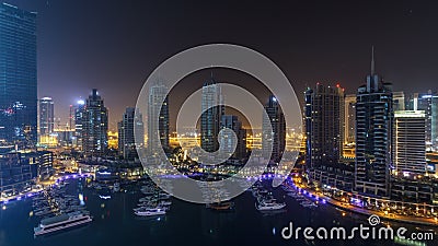 Timelapse för Dubai marina hela natten och att blänka ljus och mest högväxt skyskrapor under en klar afton arkivfilmer Timelapse för Dubai marina hela natten och att blänka ljus och mest högväxt skyskrapor under en klar afton arkivfilmer