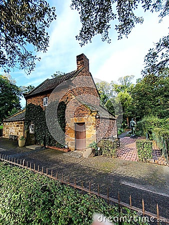 The Timeless Beauty of a Historical Cottage's Rustic Appeal Stock Photo