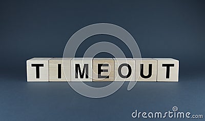 Timeout. Cubes form the word Timeout. Extensive Timeout concept Stock Photo