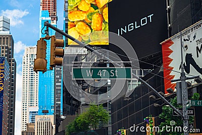 Midtown Manhattan, 47th Street. Traffic Light, Road Sign, and Skyscrapers, NYC Editorial Stock Photo