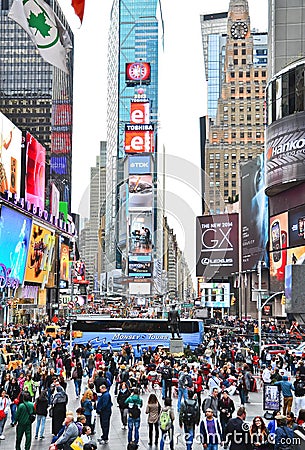 Times Square with lots of visitors in New York City Editorial Stock Photo