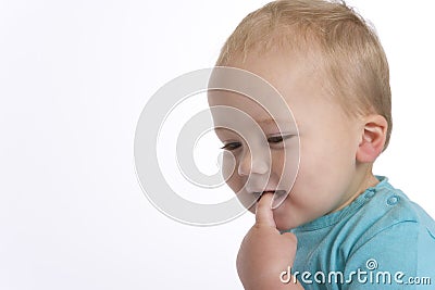 Timid baby boy portrait Stock Photo