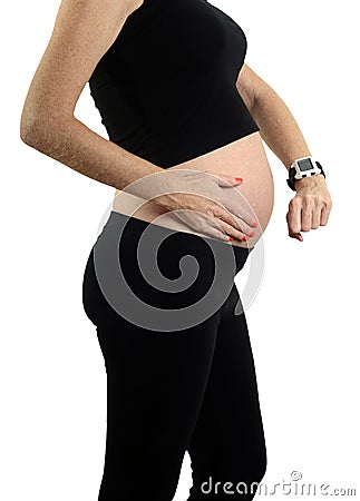 Timing contractions during pregnancy and labor Stock Photo
