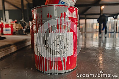 Tin bucket with toxic composition and epoxy resin inside Stock Photo