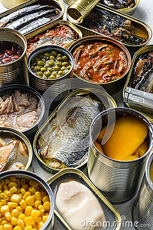 Tin cans for processed food cans conserve Saury, mackerel, sprats, sardines, pilchard, squid, tuna pinapple, corn, peas, mango , Stock Photo