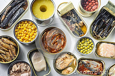 Tin cans for processed food cans conserve Saury, mackerel, sprats, sardines, pilchard, squid, tuna pinapple, corn, peas, mango Stock Photo