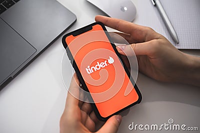 Tinder logo on smartphone screen Editorial Stock Photo