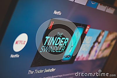 The Tinder Swindler is a new popular Netflix`s documentary about Simon Leviev who scammed women on Tinder app Editorial Stock Photo