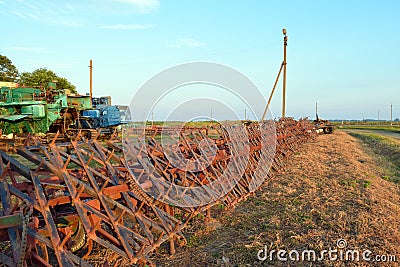 Tine harrow. Agricultural machinery and equipment. Stock Photo