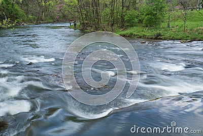 Tinker Creek Trout Stream with Two Fishermen Stock Photo