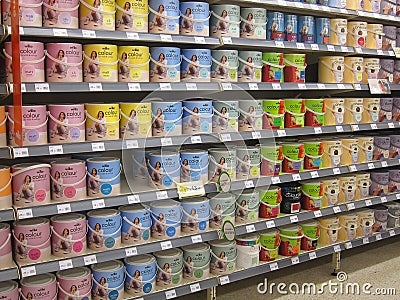 Tins of paint in a DIY store. Editorial Stock Photo