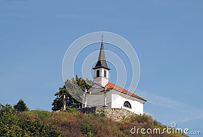 A tiny Catholic chapel on a hill in the village of Esztergom in Stock Photo