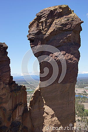 Tiny climbers on overhanging cliff Editorial Stock Photo