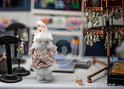 Tiny Father Christmas figure for sale at matket in Tavistock, Devon, UK Editorial Stock Photo