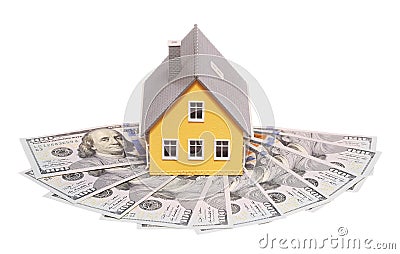 Tiny house and money isolated. Mortgage Stock Photo