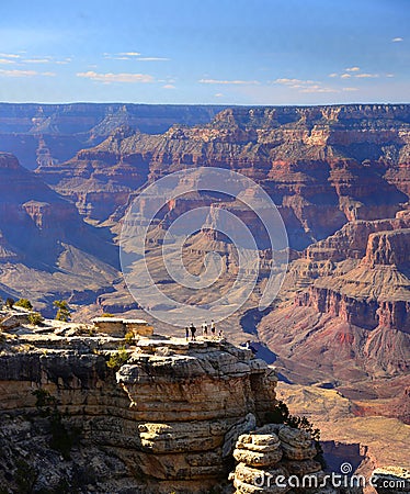 Tiny human figures put the Grand Canyon landscape in perspective at the South Rim of the Grand Canyon, Arizona. Editorial Stock Photo