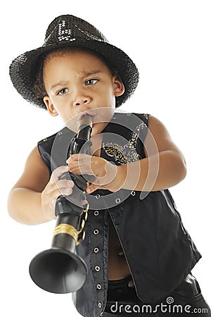 Tiny, Intense, Wanna'be Rock Star Stock Photo