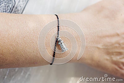 Tiny jewelry on a hand Stock Photo