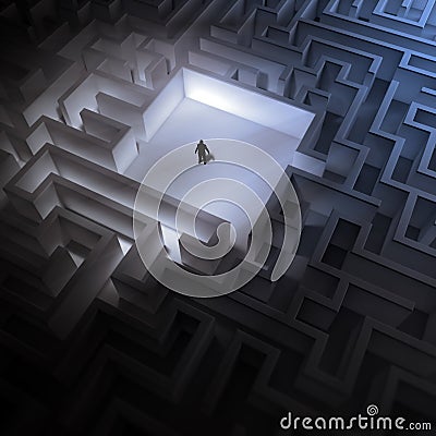 Tiny man in an endless maze Stock Photo